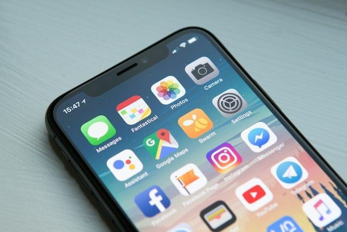 Customer holding a smartphone