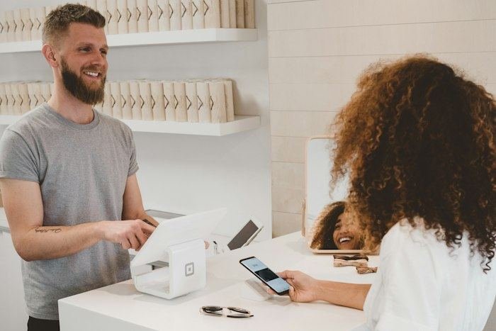 Customer interacting with a brand using a smartphone