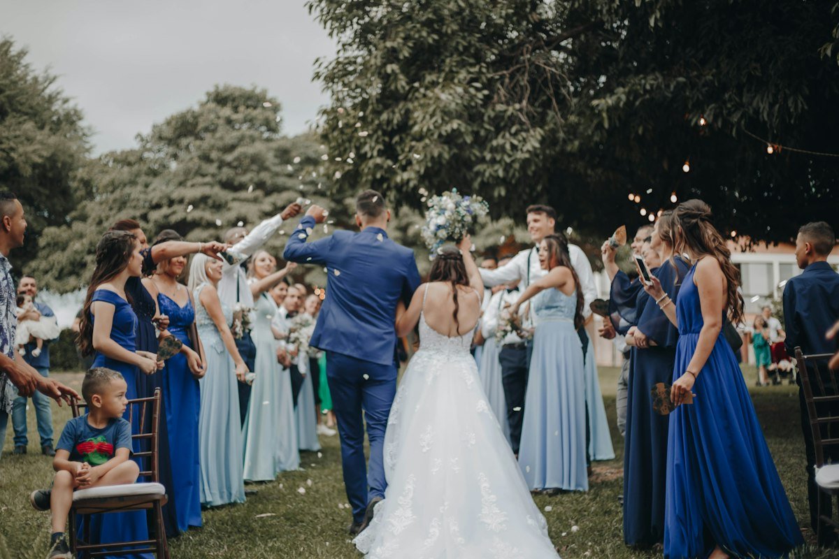 Wedding guests celebrating at the reception