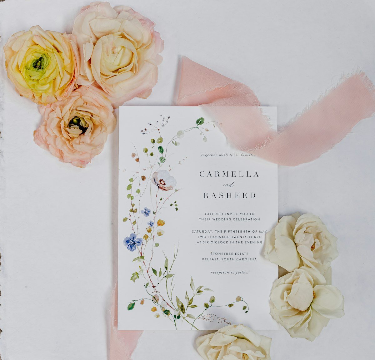 Wedding invitation suite with florals
